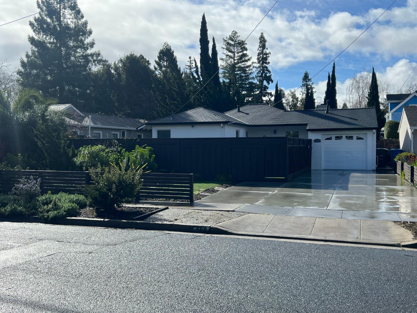a house view with a garden space