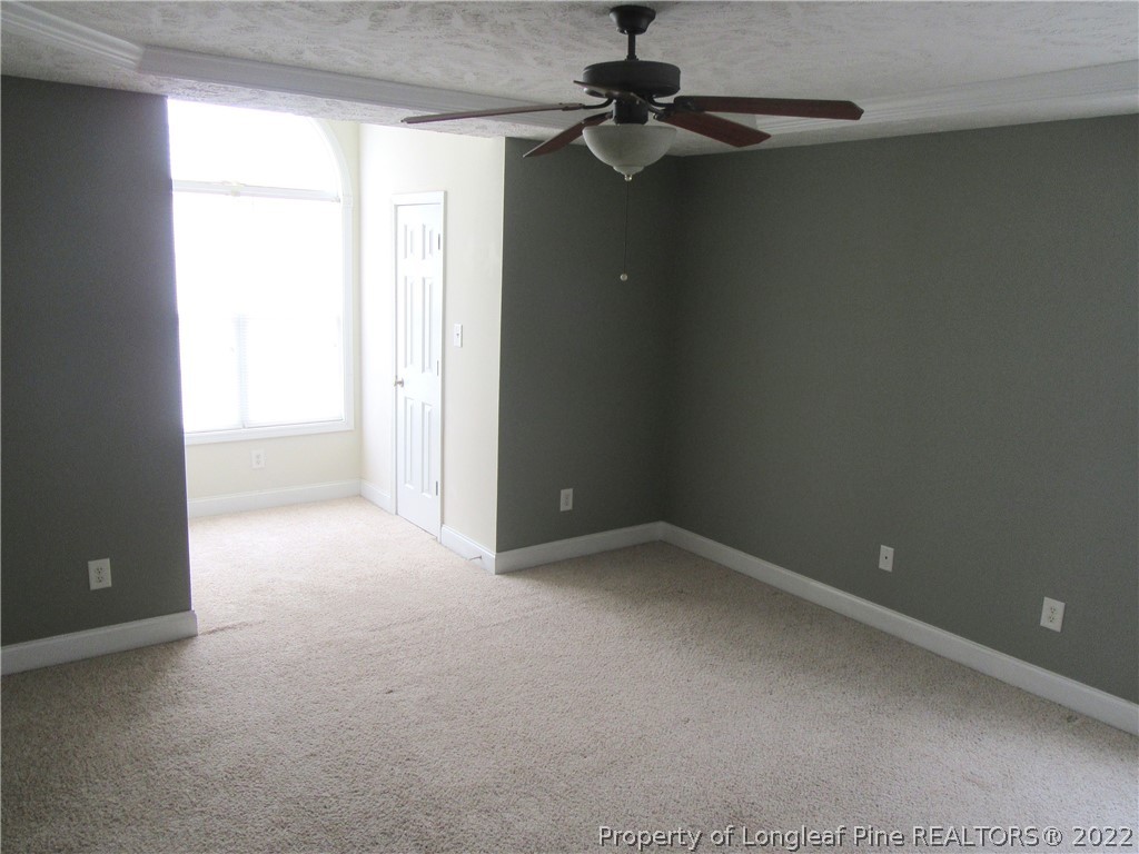 1615 Silver Ridge Court Fayetteville, NC 28304 - Photo 18 of 27 a view of an empty room with a window