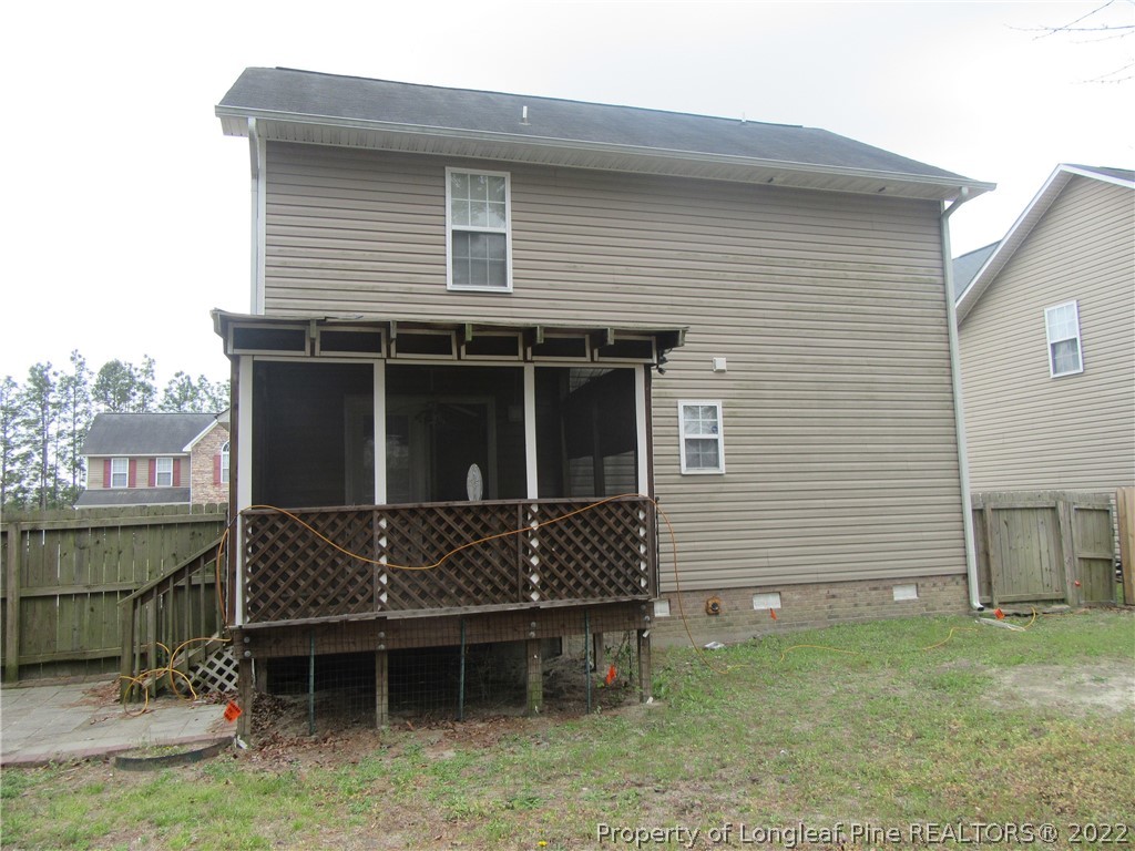 1615 Silver Ridge Court Fayetteville, NC 28304 - Photo 2 of 27 a front view of a house with garden