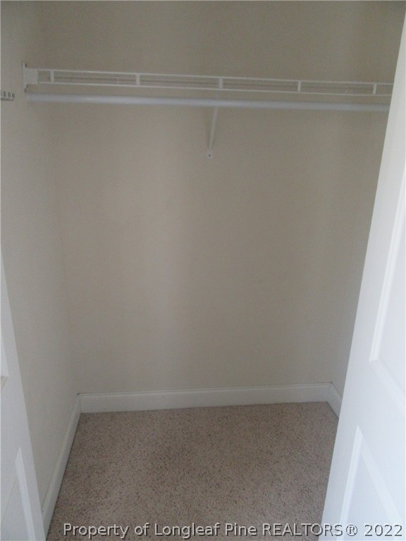 1615 Silver Ridge Court Fayetteville, NC 28304 - Photo 26 of 27 a view of small space with racks on the wall