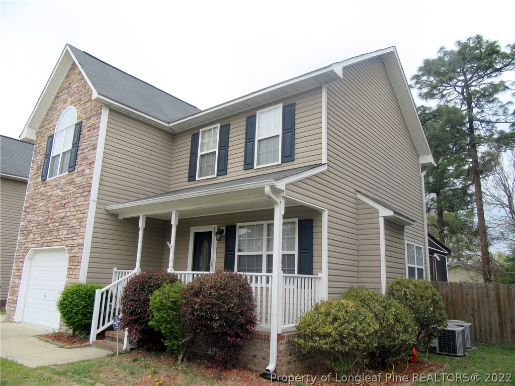 1615 Silver Ridge Court Fayetteville, NC 28304 - Photo 5 of 27 a front view of a house with a yard