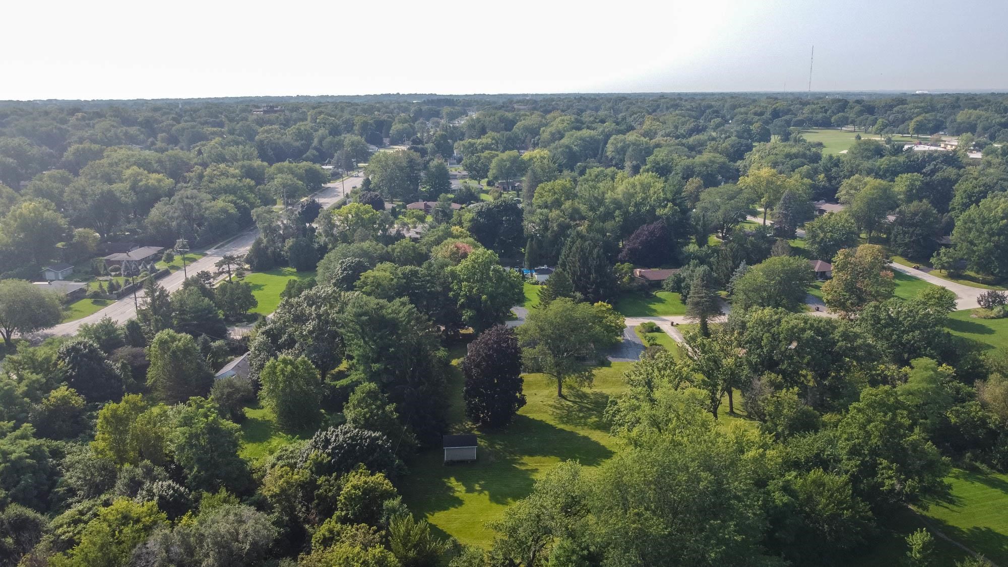3814 Brookview Road Rockford, IL 61107 - Photo 34 of 34 an aerial view of residential house with outdoor space and trees all around