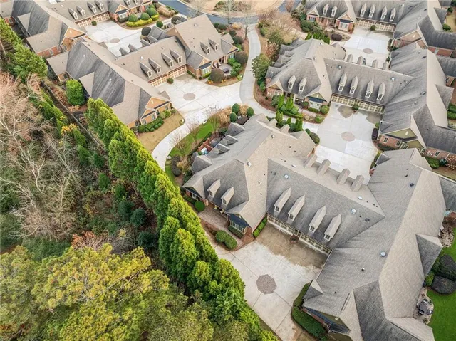 an aerial view of residential house with outdoor space