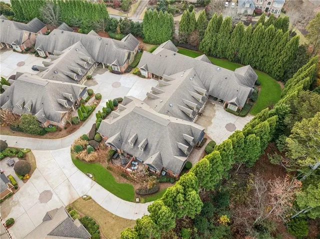 a view of a lake in middle of the green field