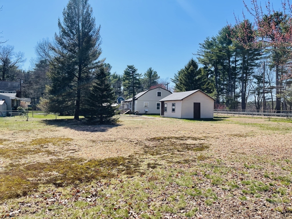 75 Frost Road Tyngsboro, MA 01879 - Photo 8 of 15 a view of swimming pool with wooden fence