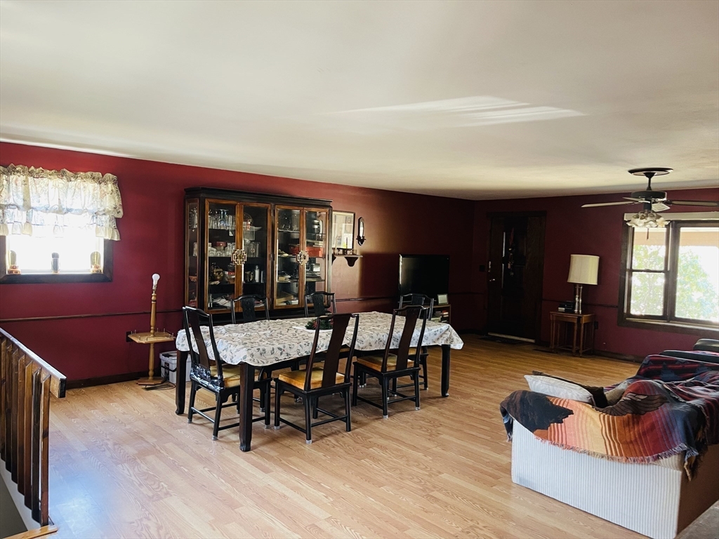 75 Frost Road Tyngsboro, MA 01879 - Photo 10 of 15 a living room with furniture and wooden floor