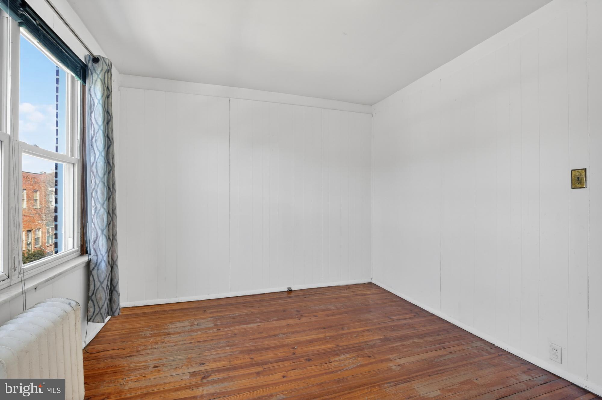 1617 South Newkirk Street Philadelphia, PA 19145 - Photo 19 of 22 a view of an empty room and window