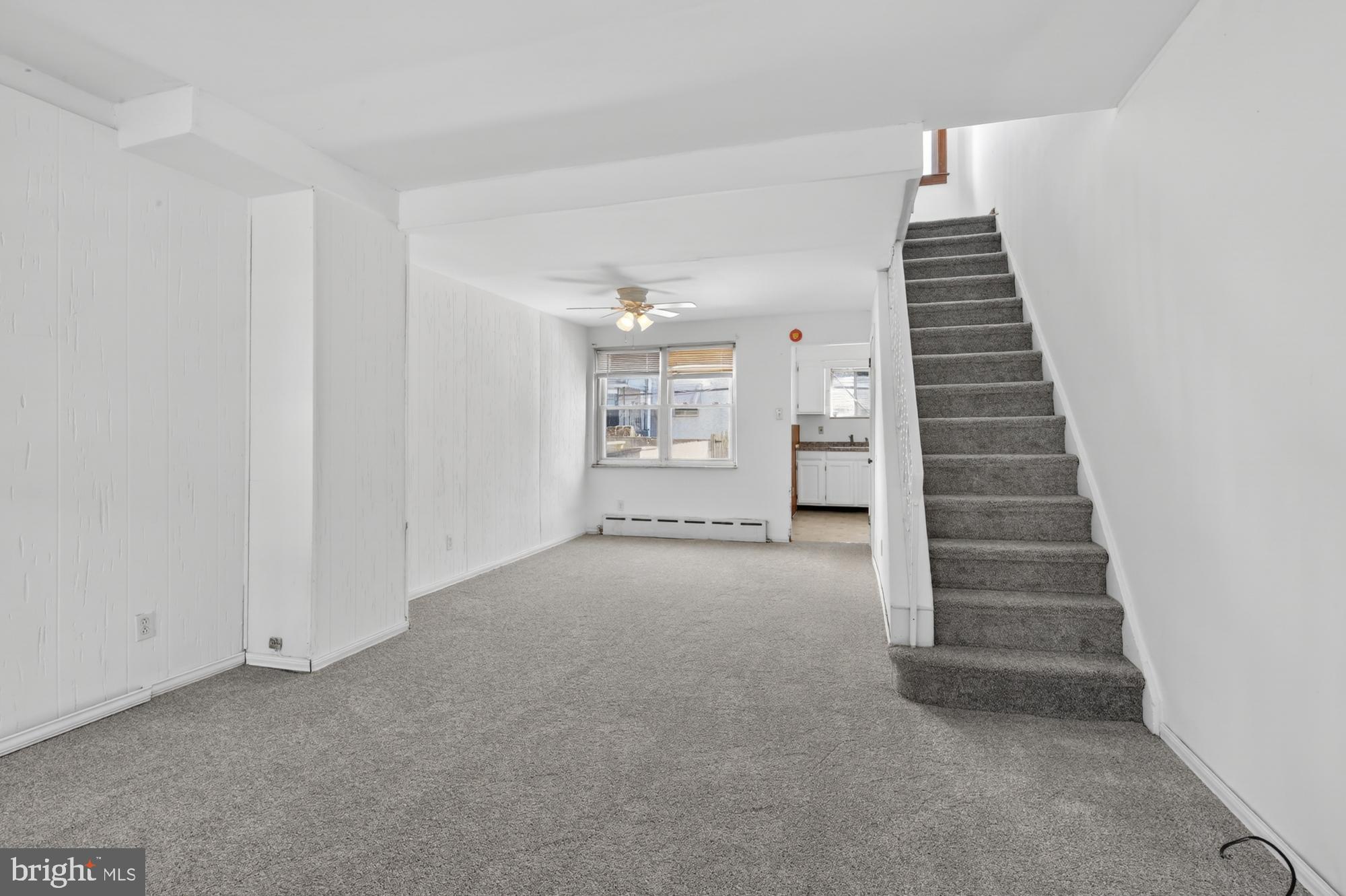 1617 South Newkirk Street Philadelphia, PA 19145 - Photo 2 of 22 a view of an empty room with a stairs