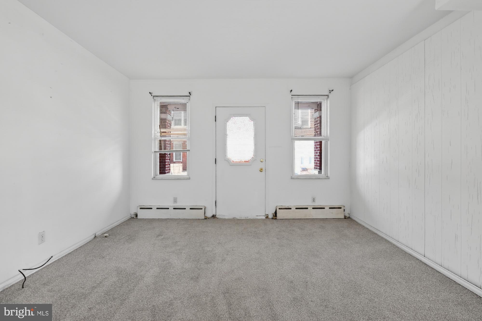 1617 South Newkirk Street Philadelphia, PA 19145 - Photo 3 of 22 an empty room with windows