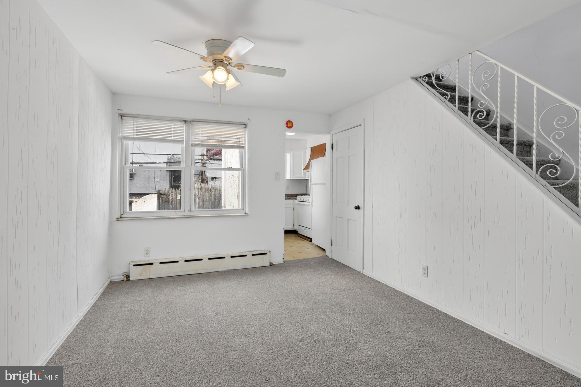 1617 South Newkirk Street Philadelphia, PA 19145 - Photo 5 of 22 a view of an empty room with a window