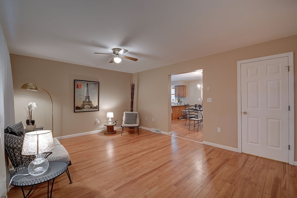 218 New Boston Road Sturbridge, MA 01566 - Photo 13 of 23 a view of a livingroom with furniture and a chandelier