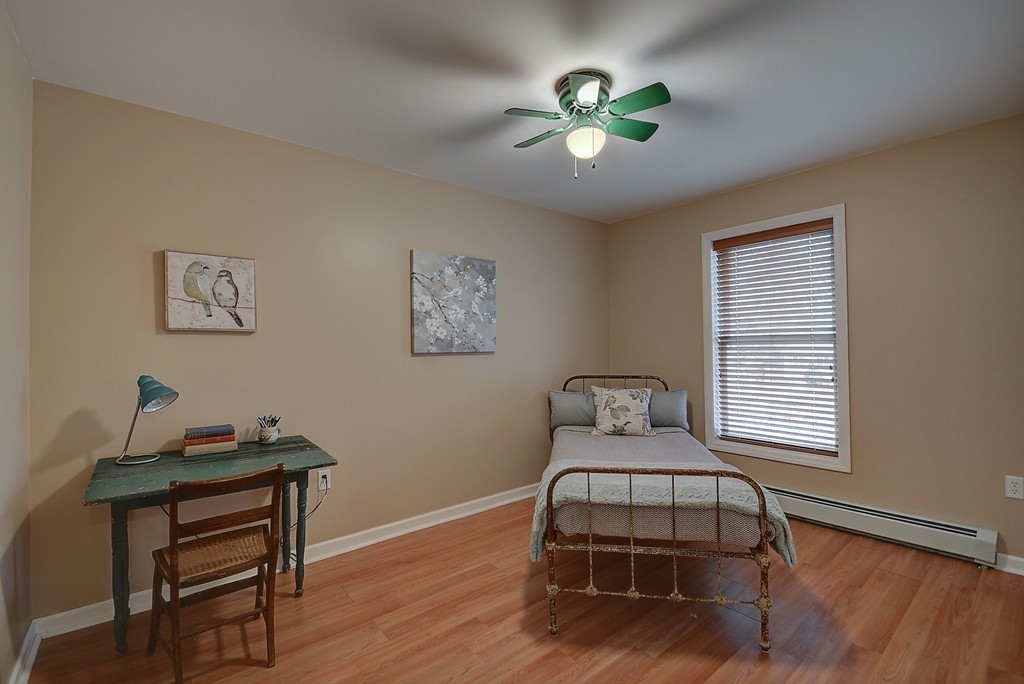 218 New Boston Road Sturbridge, MA 01566 - Photo 16 of 23 a bedroom with a bed and a window
