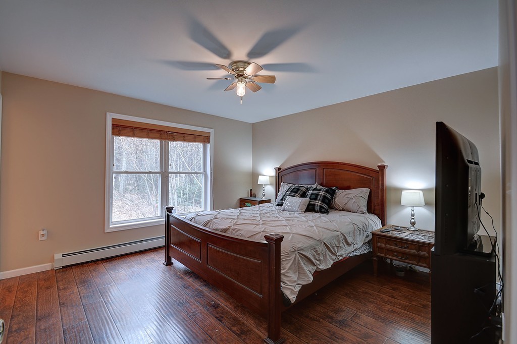 218 New Boston Road Sturbridge, MA 01566 - Photo 17 of 23 a bedroom with a bed and window