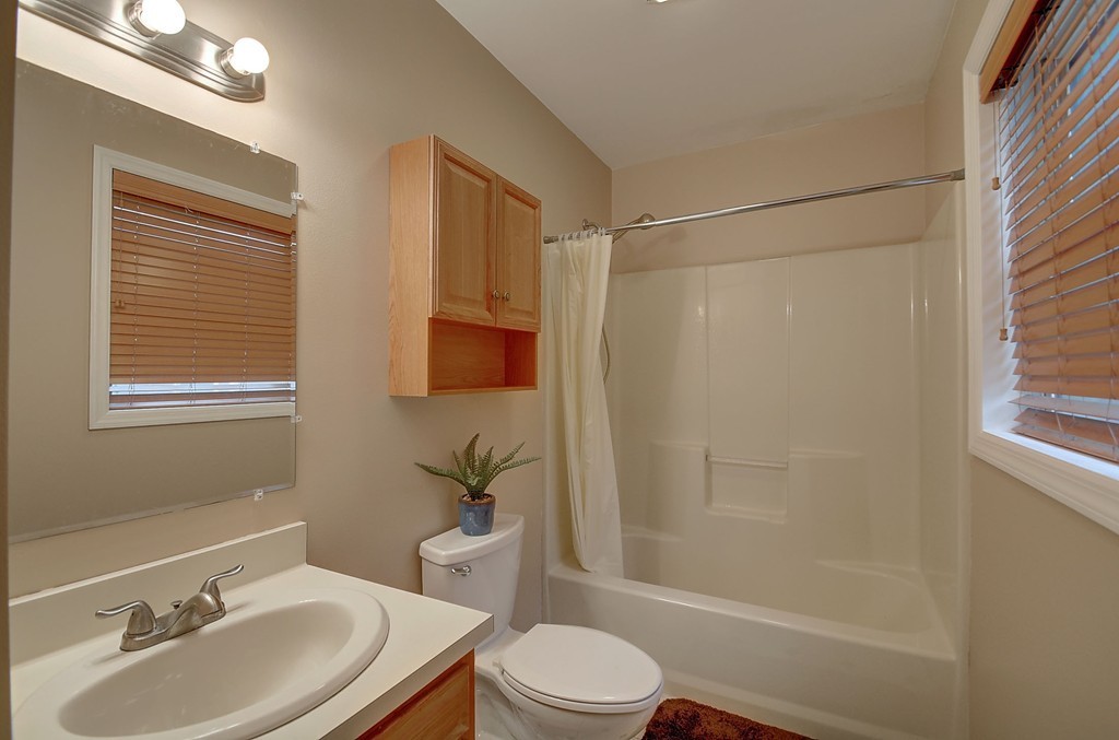 218 New Boston Road Sturbridge, MA 01566 - Photo 20 of 23 a bathroom with a sink toilet and shower