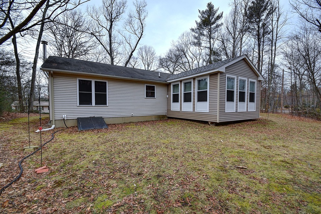 218 New Boston Road Sturbridge, MA 01566 - Photo 22 of 23 a view of a house with a yard