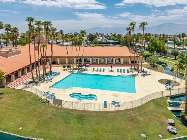 a view of a swimming pool with an ocean view