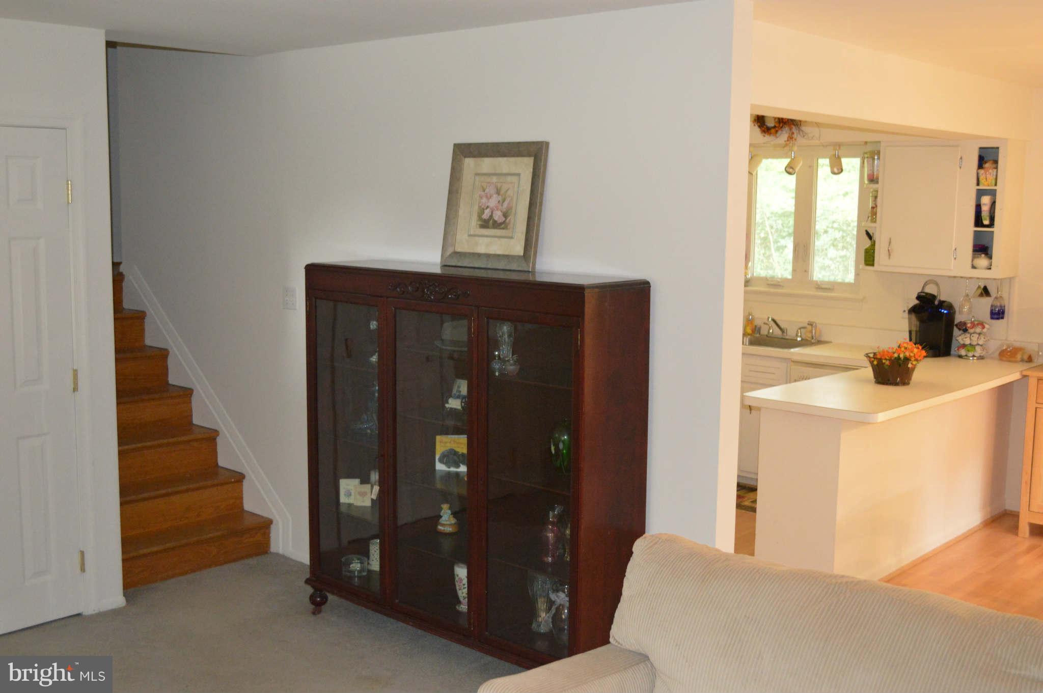 5916 Atteentee Road Springfield, VA 22150 - Photo 6 of 24 a living room with furniture and a window