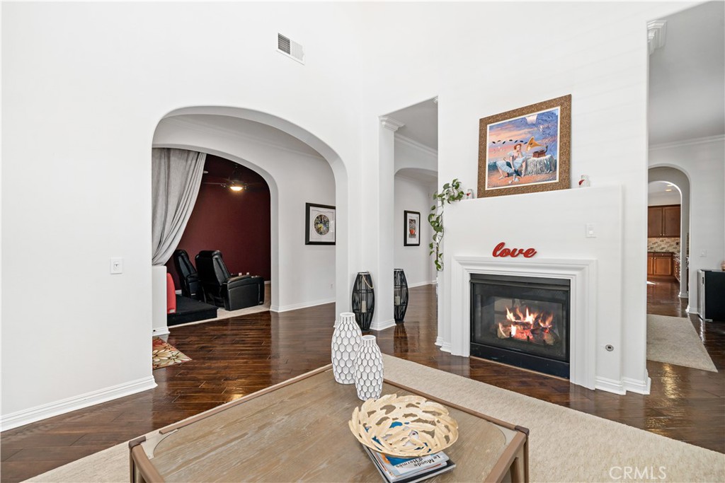16423 Village Meadow Drive Riverside, CA 92503 - Photo 12 of 63 a living room with furniture and a fireplace