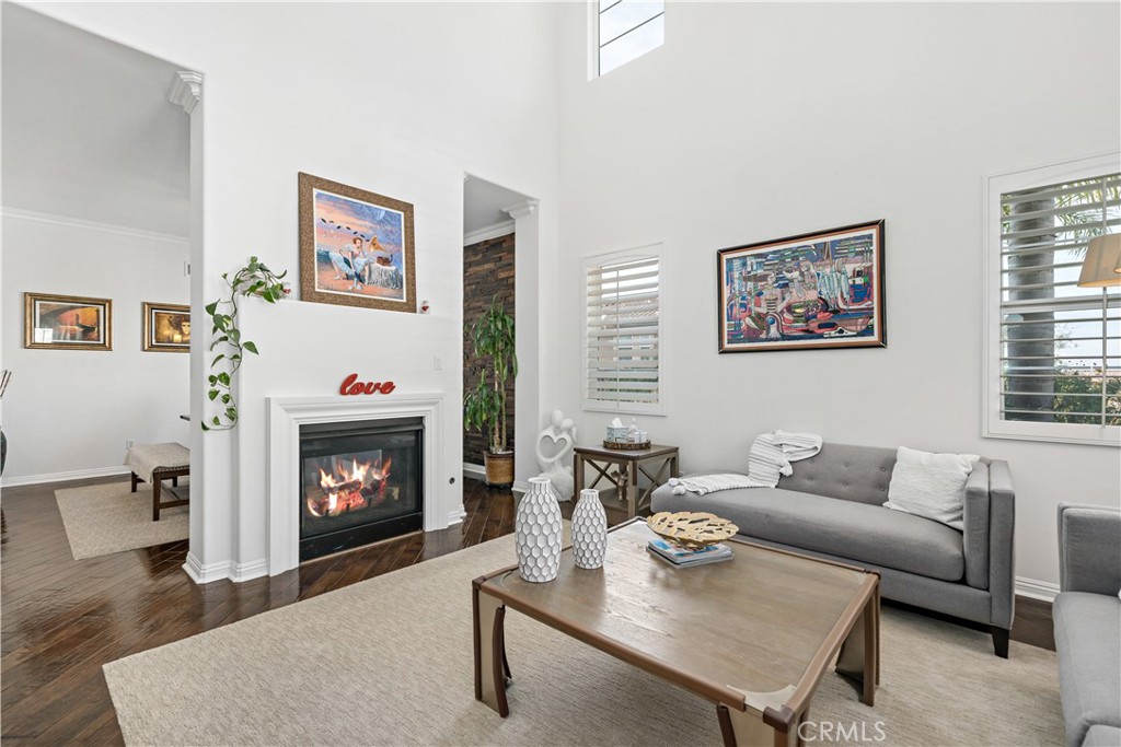 16423 Village Meadow Drive Riverside, CA 92503 - Photo 13 of 63 a living room with furniture and a fireplace