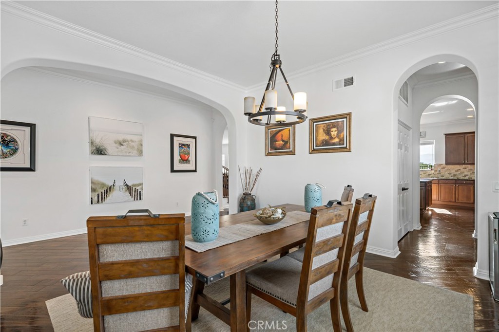 16423 Village Meadow Drive Riverside, CA 92503 - Photo 15 of 63 a dining room with furniture and window