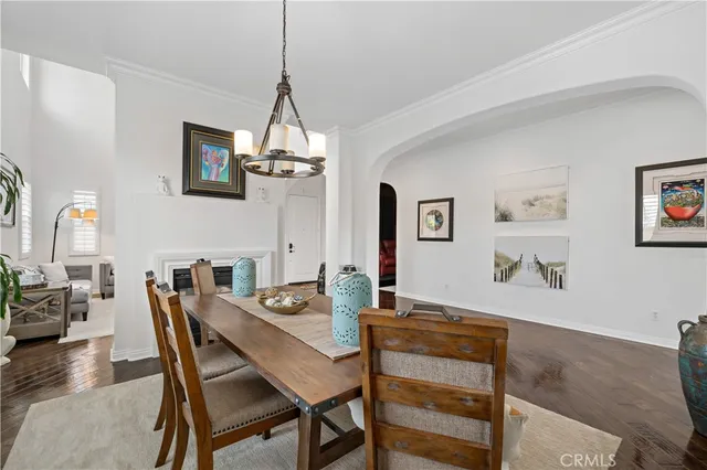 a kitchen with stainless steel appliances granite countertop wooden cabinets and a stove top oven