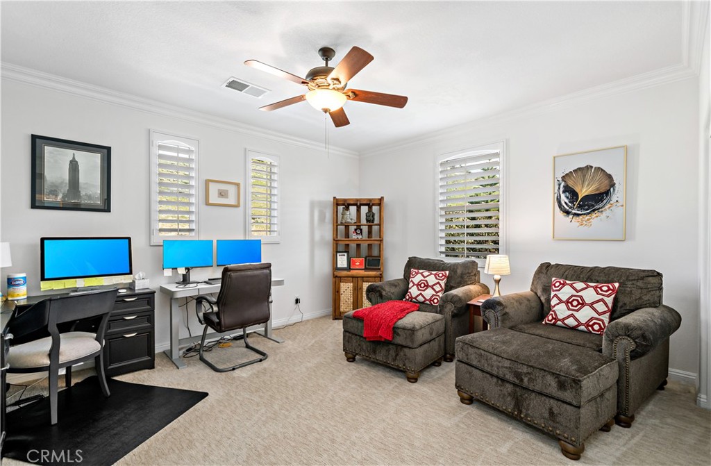 16423 Village Meadow Drive Riverside, CA 92503 - Photo 37 of 63 a living room with furniture and a window