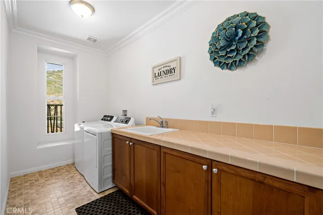 a bedroom with a large bed and a couch