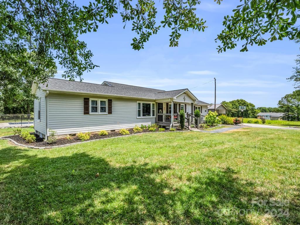 1629 State Line Road Mooresboro, NC 28114 - Photo 2 of 43 a house view with a garden space