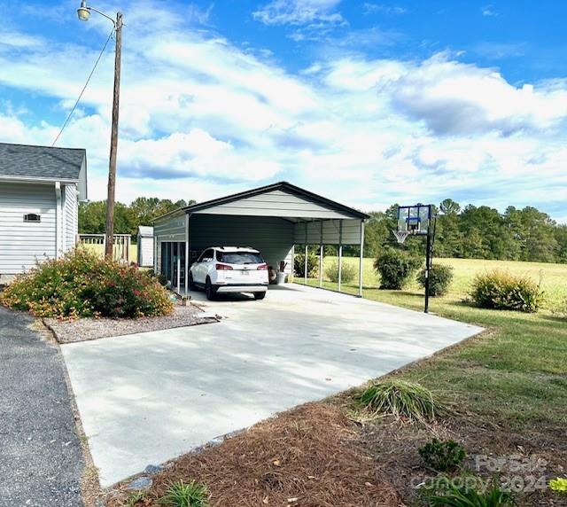 1629 State Line Road Mooresboro, NC 28114 - Photo 4 of 43 a view of a street with a car parked on the side of the road