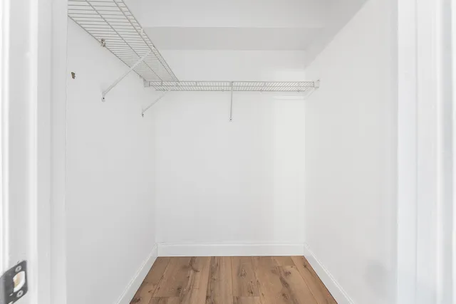 a view of a room with racks on the wall