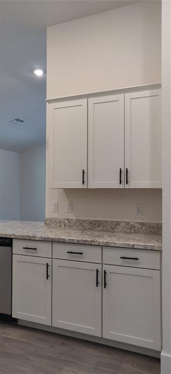 16295 Pomp Parkway Weeki Wachee, FL 34614 - Photo 11 of 28 a kitchen with granite countertop white cabinets and a sink