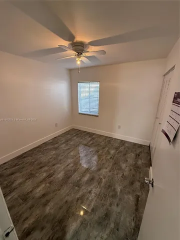 en empty room with windows