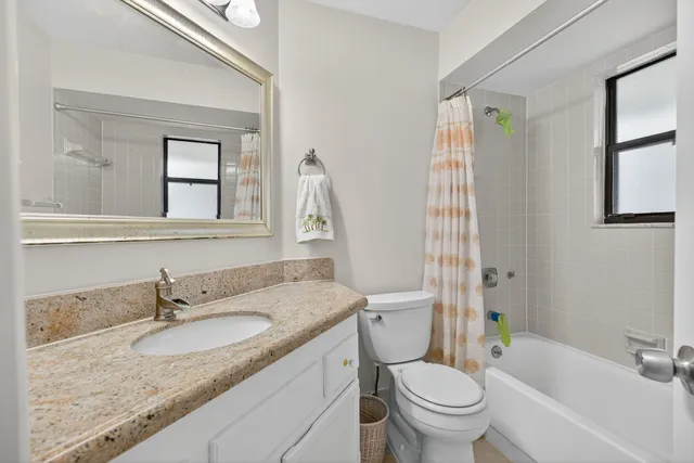 a view of storage and utility room with washer and dryer