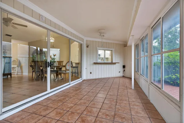 a view of a room with windows