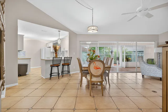 a view of dining room and hall with wooden floor