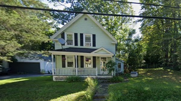 33 Center Road Shirley, MA 01464 - Photo 1 of 7 a front view of a house with a garden