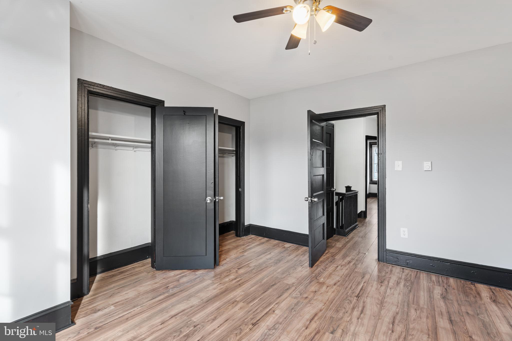 3239 North 26th Street Philadelphia, PA 19129 - Photo 26 of 28 wooden floor in an empty room with a window