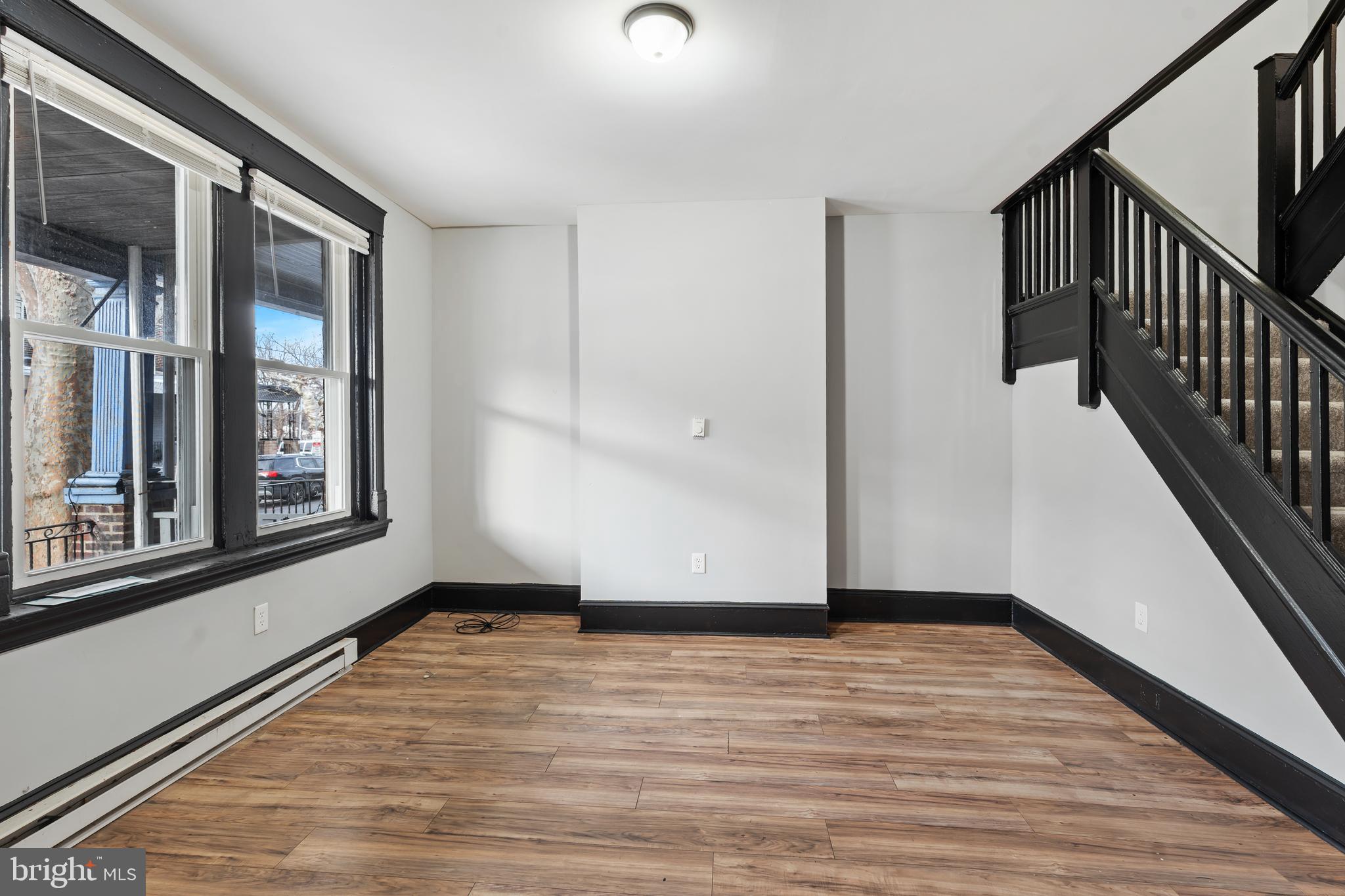 3239 North 26th Street Philadelphia, PA 19129 - Photo 4 of 28 a view of an entryway with wooden floor and door