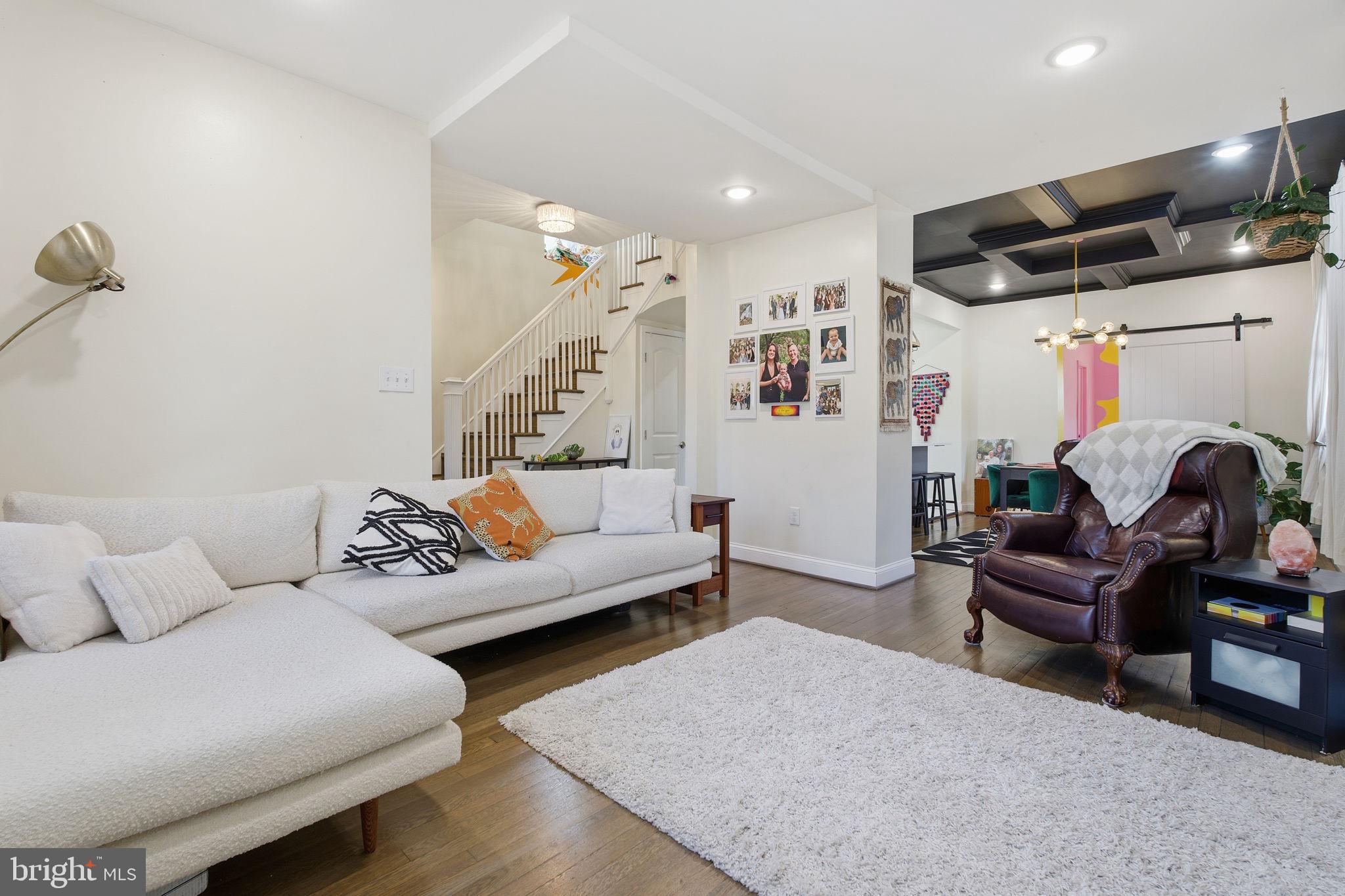 3901 Biddison Lane Baltimore, MD 21206 - Photo 3 of 38 Sunny living room with wood floors