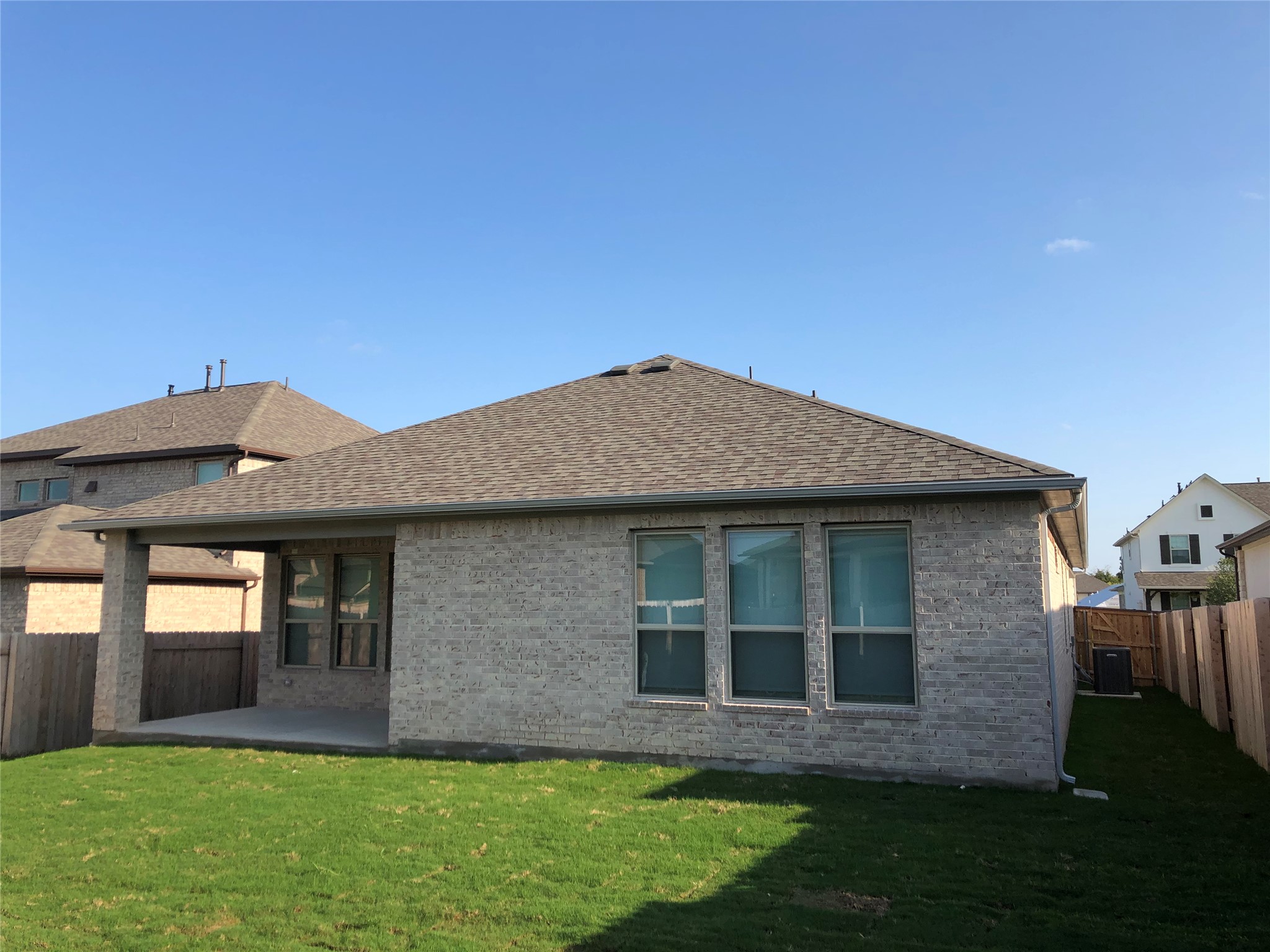 2746 Fortezza Way Round Rock, TX 78665 - Photo 16 of 16 A classic brick exterior transitions to a covered back porch overlooking the grassy yard.