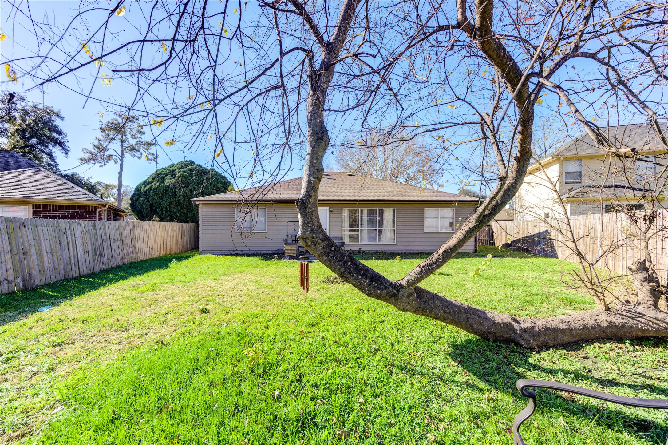 23618 Tree House Lane Spring, TX 77373 - Photo 39 of 46 a view of an house with backyard and a tree