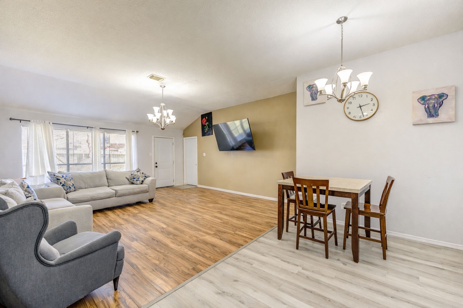 23618 Tree House Lane Spring, TX 77373 - Photo 4 of 46 a view of a dining room with furniture wooden floor and chandelier
