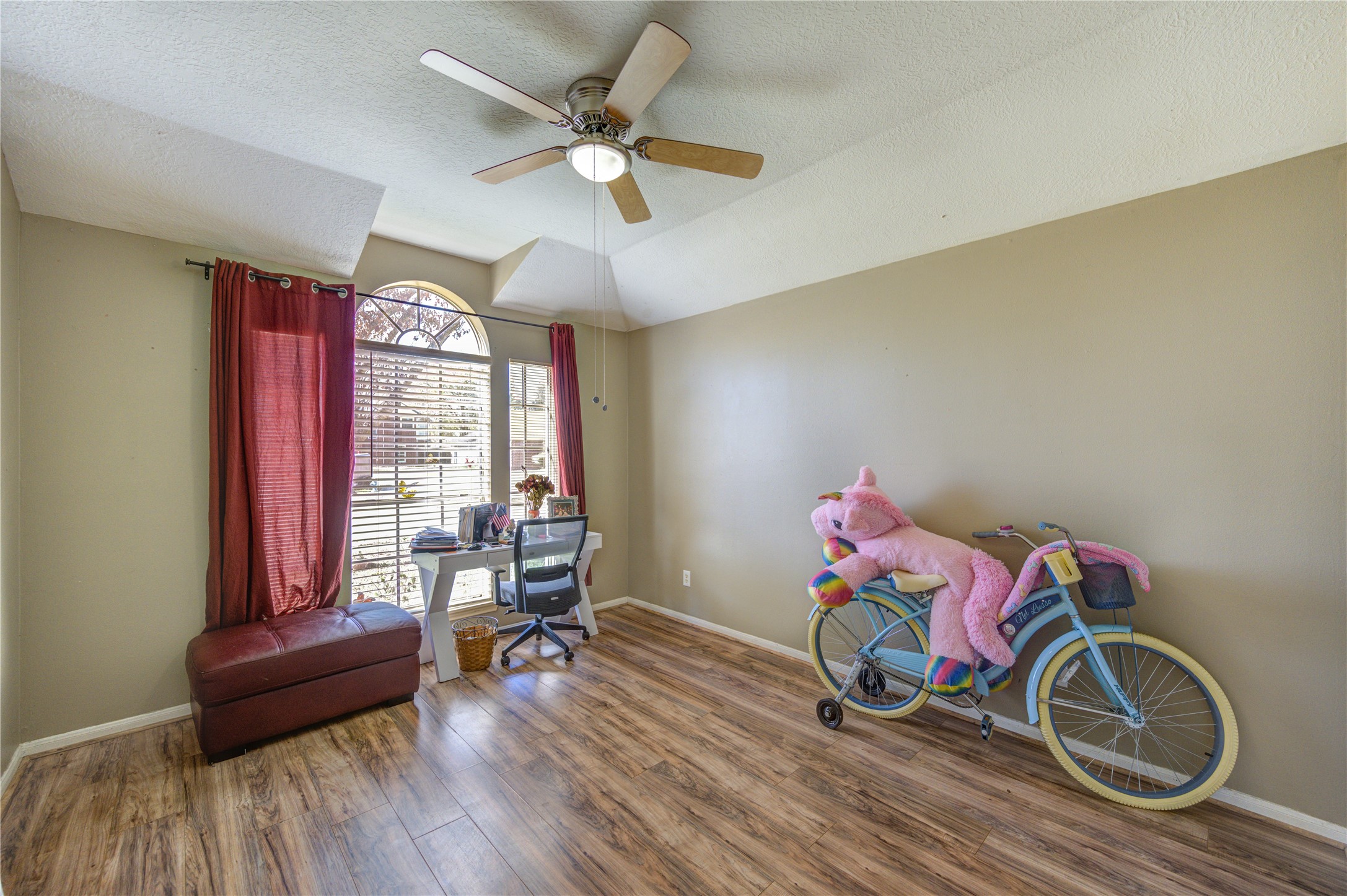 23618 Tree House Lane Spring, TX 77373 - Photo 5 of 46 a living room with furniture and a wooden floor