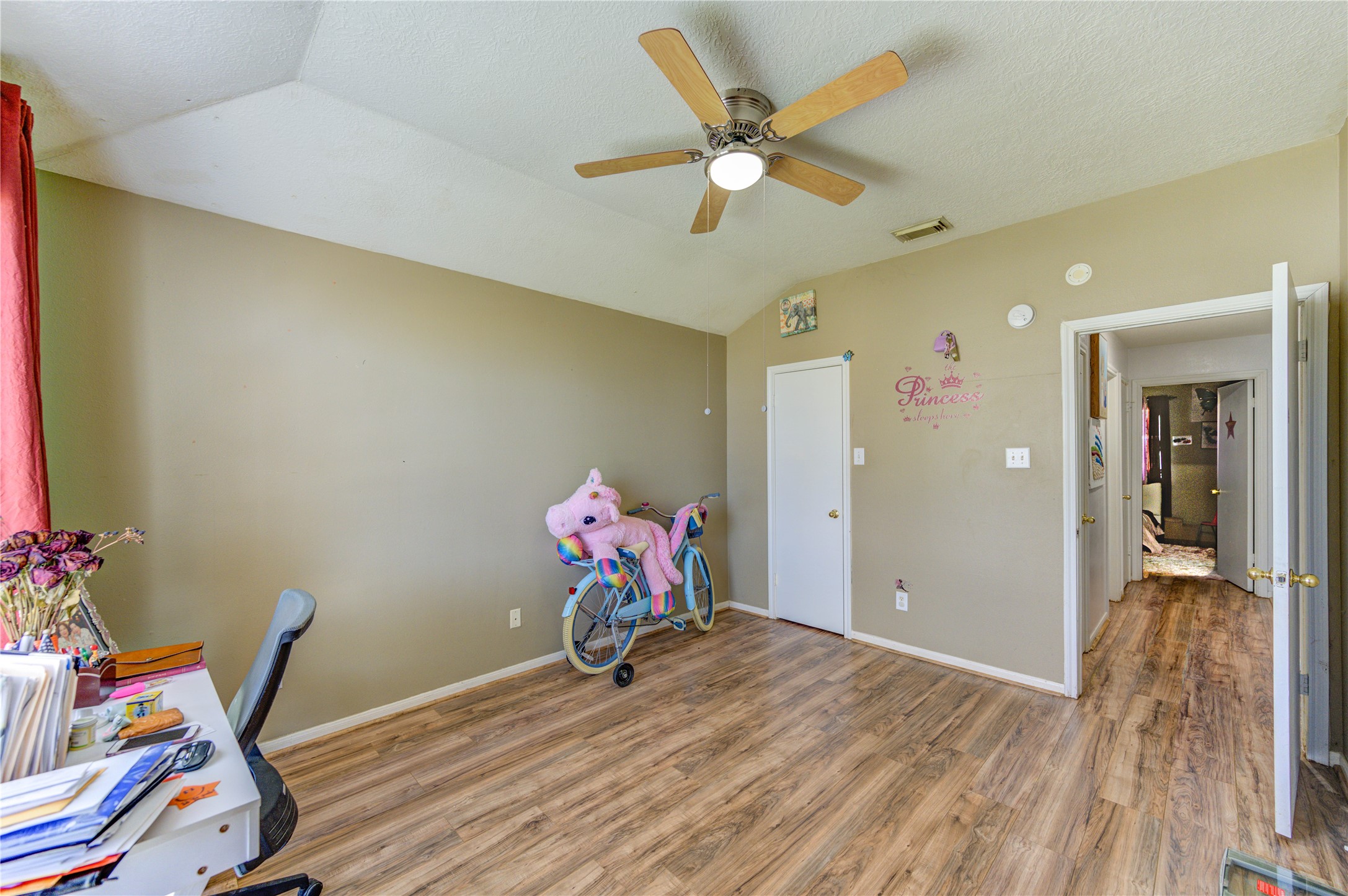 23618 Tree House Lane Spring, TX 77373 - Photo 6 of 46 a view of a workspace with furniture and wooden floor
