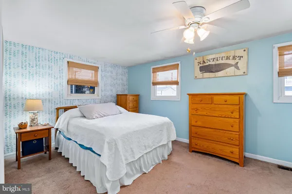 a view of a bedroom with closet and cabinet