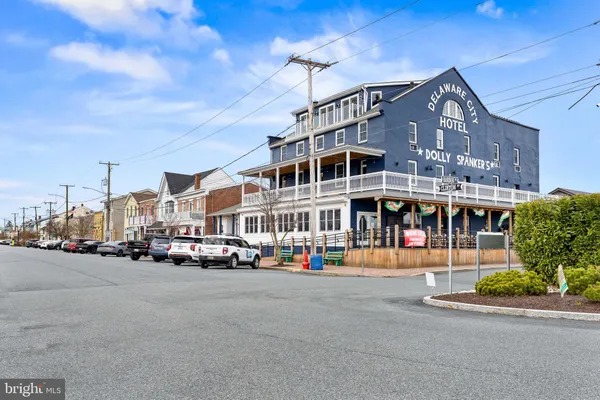 a front view of building with street view