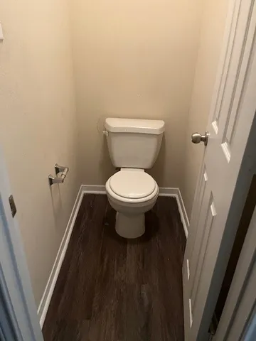 a bathroom with a toilet and a sink