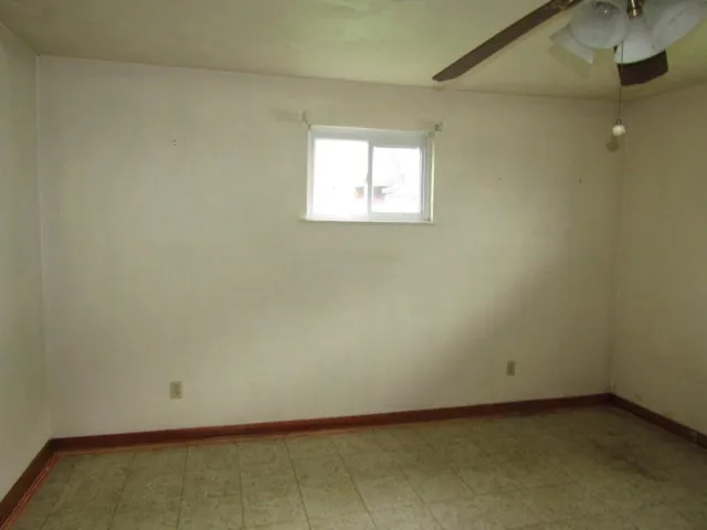 an empty room with a window