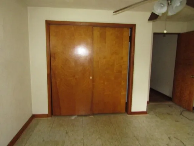 an empty room with closet