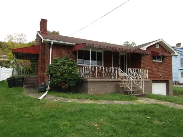 a house view with a garden space